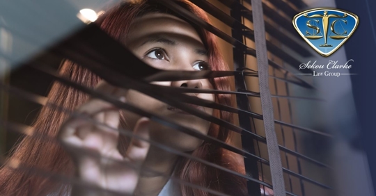 Girl looking out window